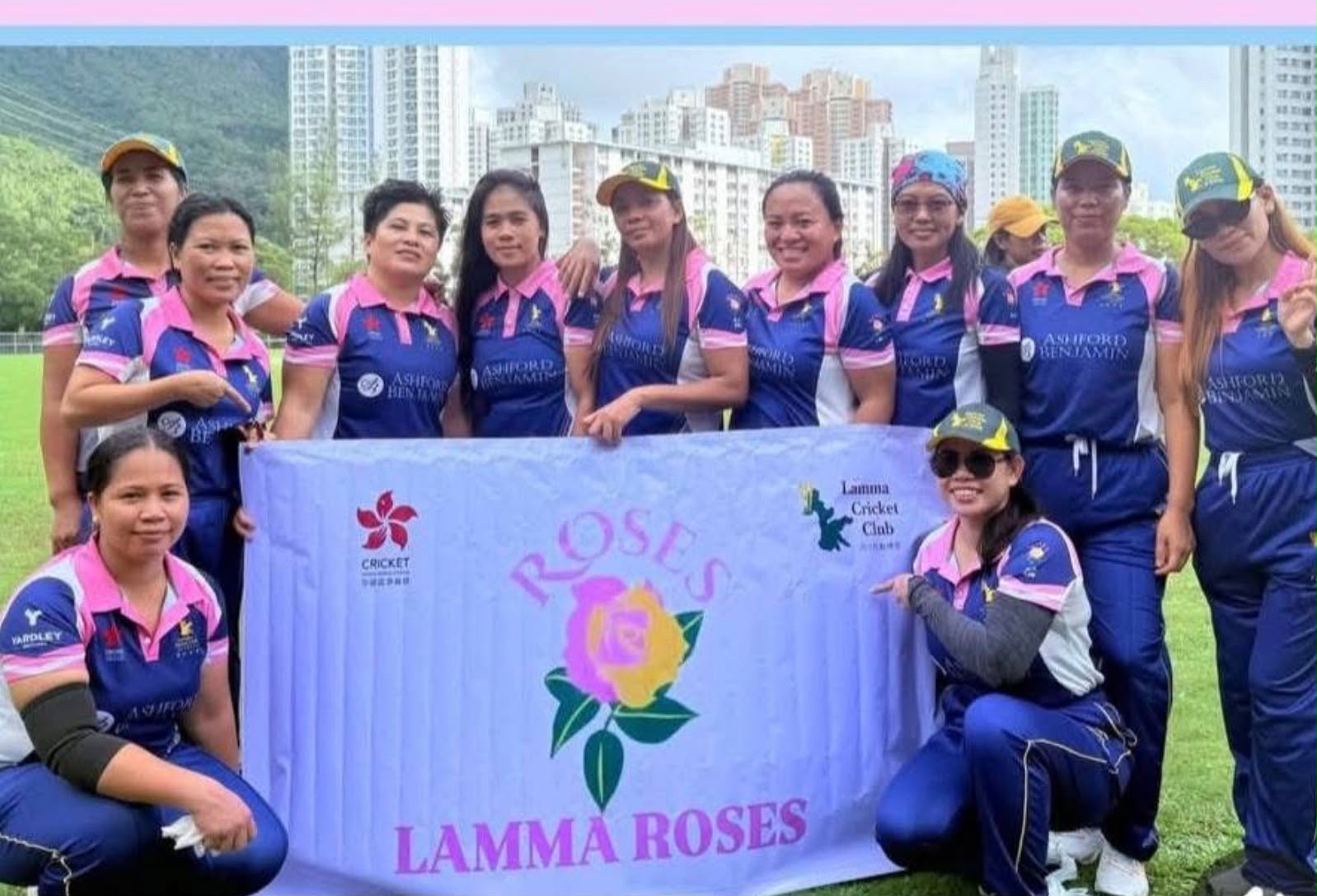 The squad with the Lamma Roses banner